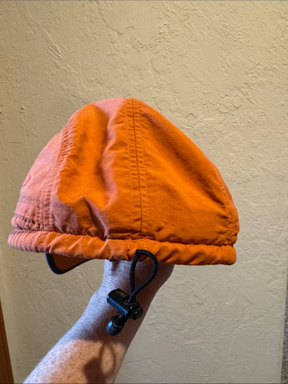 The North Face Orange Men's Trail Hat with Black Logo